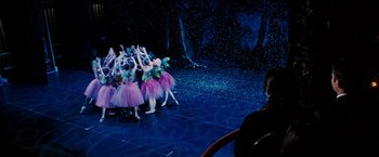 Movie still from “The Game Plan” (2007), directed by Andy Fickman – A group of young ballerinas are dancing on the stage; Wide shot, Over the shoulder angle