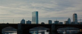 Movie still from “The Game Plan” (2007), directed by Andy Fickman – A bridge over a body of water near a city skyline; Extreme Wide shot, Low angle