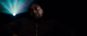 Movie still from “The Game Plan” (2007), directed by Andy Fickman – A person in a dark room; Close Up shot, Low angle