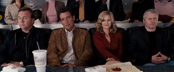 Movie still from “The Game Plan” (2007), directed by Andy Fickman – A man and a woman sitting next to each other; Medium shot, High angle