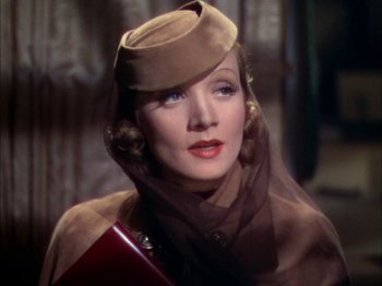 Movie still from “The Garden of Allah” (1936), directed by Richard Boleslawski – A person wearing a hat; Close Up shot, Low angle
