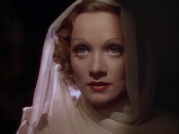 Movie still from “The Garden of Allah” (1936), directed by Richard Boleslawski – A person wearing a veil; Close Up shot, High angle
