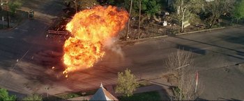 Movie still from “The Getaway” (1972), directed by Sam Peckinpah – An aerial view of an explosion in a neighborhood; Extreme Wide shot, Overhead angle