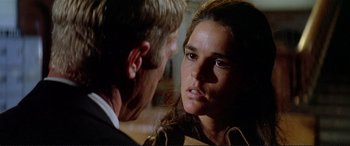 Movie still from “The Getaway” (1972), directed by Sam Peckinpah – A man and a woman talking to each other; Close Up shot, Over the shoulder angle