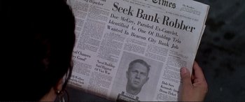 Movie still from “The Getaway” (1972), directed by Sam Peckinpah – The front page of a newspaper; Extreme Close Up shot, High angle