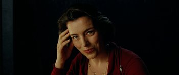 Movie still from “The Ghost Writer” (2010), directed by Roman Polanski – A person with a hand on her head; Close Up shot, Low angle