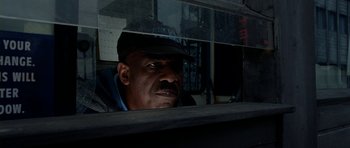 Movie still from “The Ghost Writer” (2010), directed by Roman Polanski – A man looking out of the window of a bus; Close Up shot, Low angle