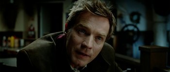 Movie still from “The Ghost Writer” (2010), directed by Roman Polanski – A person wearing a jacket; Close Up shot, Over the shoulder angle