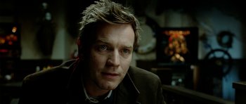 Movie still from “The Ghost Writer” (2010), directed by Roman Polanski – A person wearing a jacket; Close Up shot, Over the shoulder angle