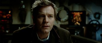 Movie still from “The Ghost Writer” (2010), directed by Roman Polanski – A person wearing a jacket; Close Up shot, Over the shoulder angle