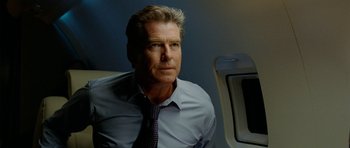 Movie still from “The Ghost Writer” (2010), directed by Roman Polanski – A person wearing a shirt and tie; Close Up shot, Over the shoulder angle