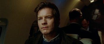 Movie still from “The Ghost Writer” (2010), directed by Roman Polanski – A person wearing a jacket and a sweater; Close Up shot, Low angle
