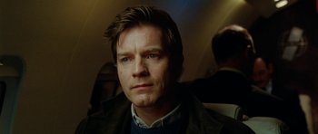 Movie still from “The Ghost Writer” (2010), directed by Roman Polanski – A person wearing a jacket; Close Up shot, Low angle