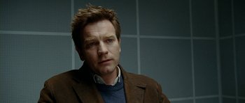 Movie still from “The Ghost Writer” (2010), directed by Roman Polanski – A person wearing a jacket; Close Up shot, Over the shoulder angle