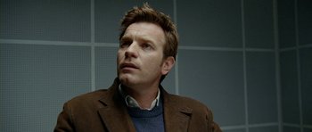 Movie still from “The Ghost Writer” (2010), directed by Roman Polanski – A person wearing a jacket; Close Up shot, Low angle