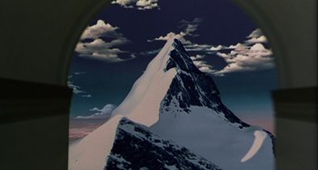 Movie still from “The Gift” (2000), directed by Sam Raimi – A person is skiing down a snowy mountain; Extreme Wide shot, Low angle