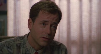 Movie still from “The Gift” (2000), directed by Sam Raimi – A person wearing a shirt and a tie; Close Up shot, Over the shoulder angle
