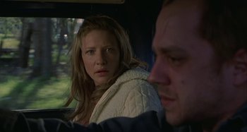 Movie still from “The Gift” (2000), directed by Sam Raimi – A woman sitting next to a man in a car; Close Up shot, Over the shoulder angle