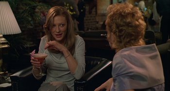 Movie still from “The Gift” (2000), directed by Sam Raimi – Two women are sitting at a table talking; Medium shot, Over the shoulder angle