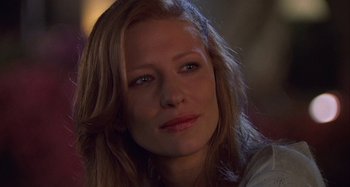 Movie still from “The Gift” (2000), directed by Sam Raimi – A person with long hair; Close Up shot, Over the shoulder angle