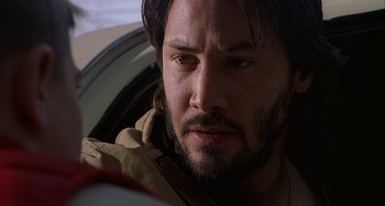 Movie still from “The Gift” (2000), directed by Sam Raimi – A person with a beard; Close Up shot, Low angle