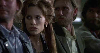 Movie still from “The Gift” (2000), directed by Sam Raimi – A young woman and an older man standing next to each other; Close Up shot, Over the shoulder angle