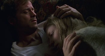 Movie still from “The Gift” (2000), directed by Sam Raimi – A man and a woman laying in a bed; Close Up shot, Low angle