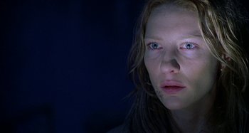 Movie still from “The Gift” (2000), directed by Sam Raimi – A person looking at the camera; Close Up shot, Low angle
