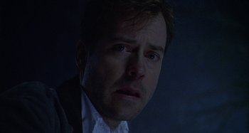 Movie still from “The Gift” (2000), directed by Sam Raimi – A person looking at the camera; Close Up shot, Low angle