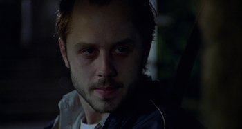 Movie still from “The Gift” (2000), directed by Sam Raimi – A person wearing a jacket; Close Up shot, Low angle