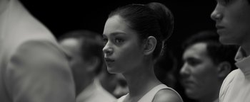 Movie still from “The Giver” (2014), directed by Phillip Noyce – A young woman is looking into the distance; Close Up shot, Low angle