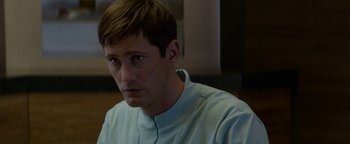 Movie still from “The Giver” (2014), directed by Phillip Noyce – A person wearing a white shirt; Close Up shot, Over the shoulder angle