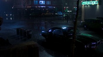 Movie still from “The Goodbye Girl” (1977), directed by Herbert Ross – A car that is parked on the side of the street; Extreme Wide shot, High angle