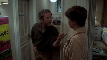 Movie still from “The Goodbye Girl” (1977), directed by Herbert Ross – A man and a woman are talking in a room; Medium shot, Over the shoulder angle