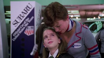 Movie still from “The Goodbye Girl” (1977), directed by Herbert Ross – A woman and a girl are hugging each other; Close Up shot, Over the shoulder angle