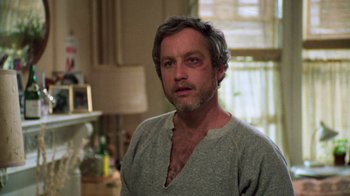Movie still from “The Goodbye Girl” (1977), directed by Herbert Ross – A person wearing a shirt; Close Up shot, Low angle