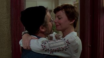 Movie still from “The Goodbye Girl” (1977), directed by Herbert Ross – A man and a woman embracing each other; Close Up shot, Over the shoulder angle