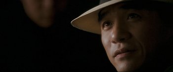 Movie still from “The Grandmaster” (2013), directed by Kar-Wai Wong – A person wearing a hat; Close Up shot, Low angle