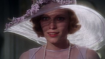 Movie still from “The Great Gatsby” (1974), directed by Jack Clayton – A person wearing a hat; Close Up shot, Low angle