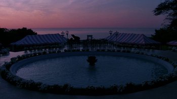 Movie still from “The Great Gatsby” (1974), directed by Jack Clayton – A view of the ocean at night from a balcony; Extreme Wide shot, High angle