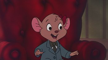 Movie still from “The Great Mouse Detective” (1986), directed by David Michener – A cartoon of a mouse wearing a suit and tie; Medium shot, High angle