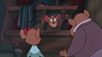 Movie still from “The Great Mouse Detective” (1986), directed by David Michener – A cartoon picture of two mice looking at another mouse in a mirror; Medium shot, Over the shoulder angle