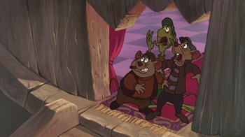 Movie still from “The Great Mouse Detective” (1986), directed by David Michener – A group of people standing next to each other in front of a stage; Wide shot, High angle