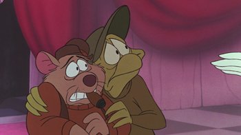 Movie still from “The Great Mouse Detective” (1986), directed by David Michener – A couple of cartoon characters sitting next to each other; Close Up shot, Over the shoulder angle