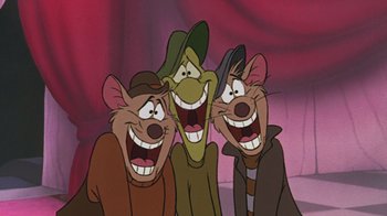 Movie still from “The Great Mouse Detective” (1986), directed by David Michener – A group of three cartoon mice standing next to each other; Close Up shot, Low angle