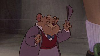 Movie still from “The Great Mouse Detective” (1986), directed by David Michener – A picture of a character from the disney movie the hunchback of notre - dame; Close Up shot, High angle