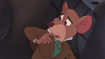 Movie still from “The Great Mouse Detective” (1986), directed by David Michener – A picture of a character from a cartoon; Close Up shot, High angle