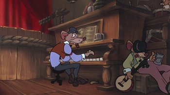 Movie still from “The Great Mouse Detective” (1986), directed by David Michener – An animated mouse playing the piano while another mouse plays the guitar; Wide shot, High angle
