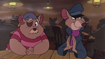 Movie still from “The Great Mouse Detective” (1986), directed by David Michener – Two cartoon characters sitting at a wooden table; Close Up shot, Over the shoulder angle