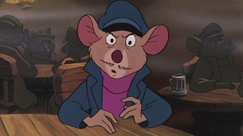 Movie still from “The Great Mouse Detective” (1986), directed by David Michener – A cartoon mouse wearing a blue jacket and a purple shirt; Close Up shot, High angle